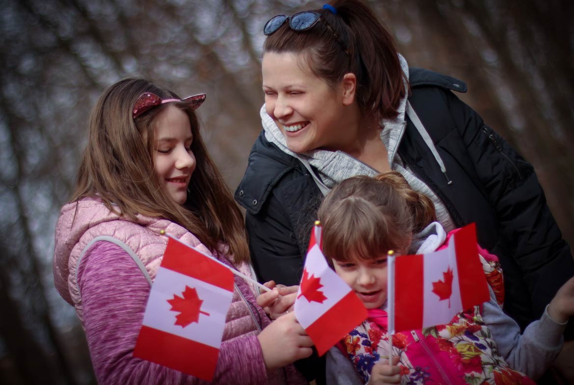 Minderjährige mit nur einem Elternteil in Kanada einreisen